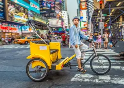 A new bill would ban pedicabs from Broadway. Some drivers say it misses the point.